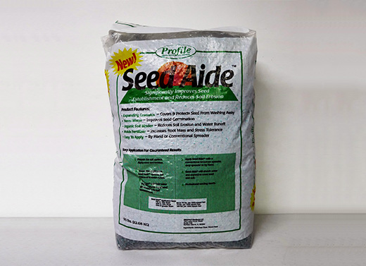 Bag of Grass Seed Aide